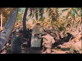 A catholic mass being conducted by a chaplain in makin islands