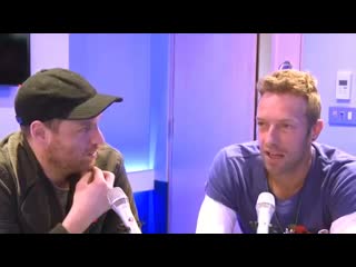 Chris and jonny (coldplay) talking lovely things about noel gallagher