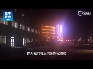 Video from hubei province shows doctors running across the street to take patients who are