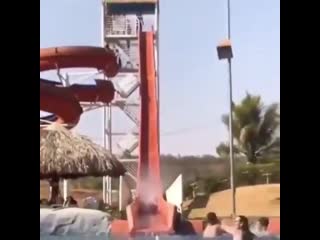 Swimming in front of the end of a waterslide