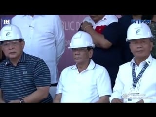 President duterte looks on as luxury cars get destroyed