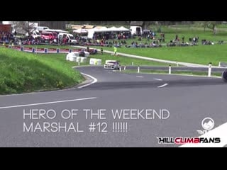 Old woman trying to cross the track at hillclimb race