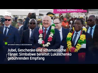 Jubel, geschenke und schamanische tänze simbabwe bereitet lukaschenko gebührenden empfang