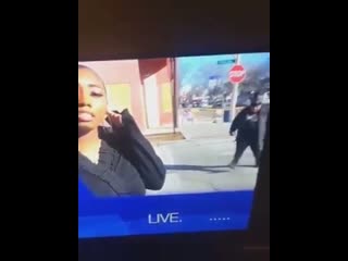 Guy realizes he's on a live news broadcast, starts dancing