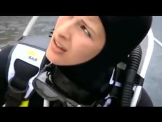 Female scuba diver trapped in net!