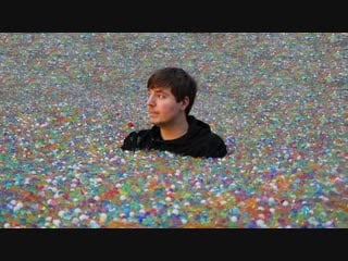 [mrbeast] i put 100 million orbeez in my friend's backyard