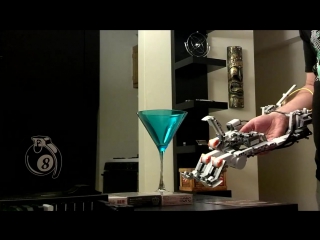 Prototype mk i mindstorms robotic hand picking up a martini glass