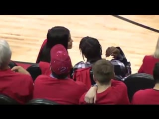 Kylie jenner and travis scott sitting courtside at rockets v thunder