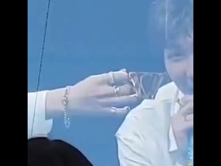 Jin trying to be a pro pouring tea on jimins cup and ending up pouring it all over his han