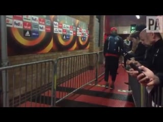 #mufc defender marcos rojo limps through the old trafford mixed zone after telli