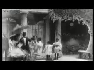Uncle toms cabin group and solo cakewalk dance (1903)