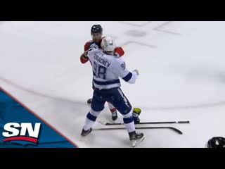 Sam bennett drops the gloves with mikhail sergachev after things get chippy in f