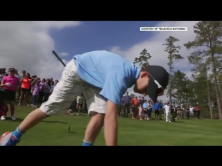 A boy and tiger woods