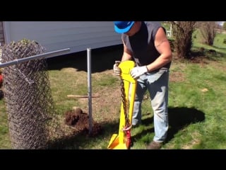 Pop old fence posts right out with manual post puller
