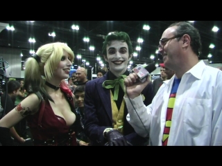 Clark kent interviews arkham citys harley quinn the joker