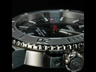 Новые часы oris aquis date relief