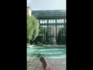 Video from charlbrown ig storyadam and charl relaxing by the pool