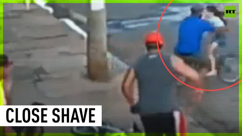 Very Close Call ! Guy Saves Girl From Crashing Into Pillar