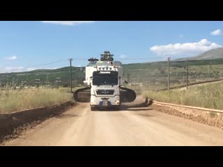 Transporting the huge liebherr 984 excavator 130 tones by side heavy transports