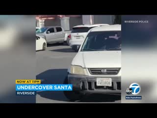 Undercover officers dressed as santa claus and elf nab suspected car thieves in