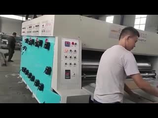 Chain feed flexo printer diecutter with slot attach