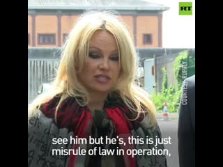 Pamela anderson admits to feeling 'sick, nauseous' after visiting julian assange at hm prison belmarsh