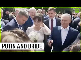 Putin takes picture with bride in kronstadt