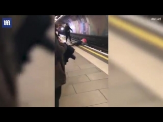 Two drunk guys hurl each other in front of a victoria line train