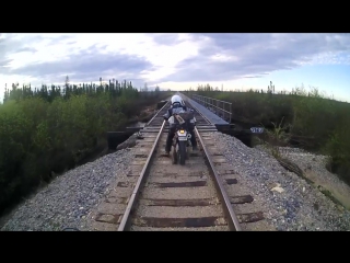 Motorcycle falls through railroad track! some nsfw (but entirely appropriate) language!