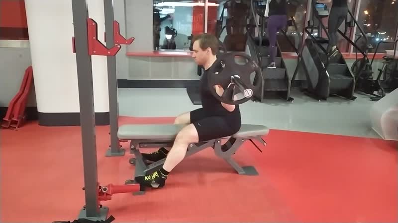 Наклоны со штангой сидя