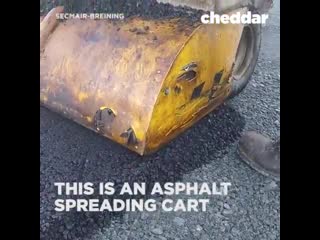 This is an asphalt spreading cart