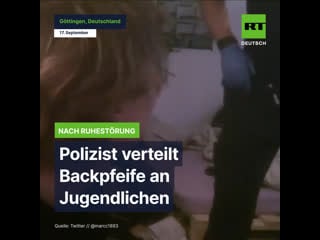 Polizist verteilt backpfeife an jugendlichen