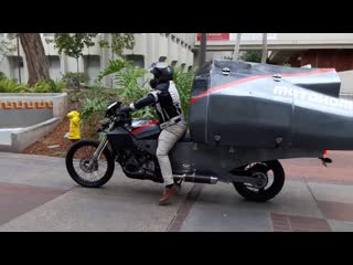 The motohome and jeremy carman ride away after 2018 usc graduation