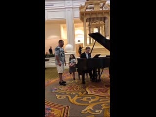 Daddy sings ave maria in hotel lobby his daughter’s look is everything