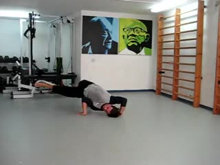 Role into qdr rotational push ups