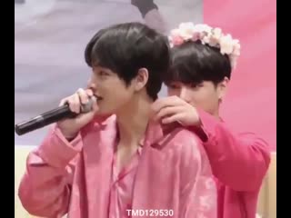 Jungkook suddenly found taehyungs nape interesting and started playing with his collar