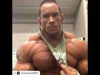 Young bodybuilder posing shredded[1]