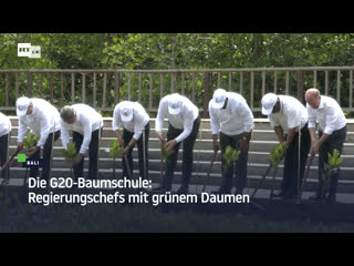 Die g20 baumschule regierungschefs mit grünem daumen