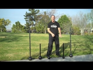 Macebell exercise 2 handed mill with a short mace by rik brown