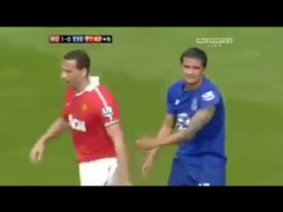 Rio ferdinand picks up tim cahill with one hand