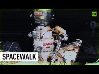 Russian & italian astronomers work outside iss to activate robotic arm