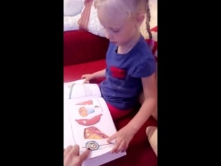 Alisa is reading hungry caterpillar