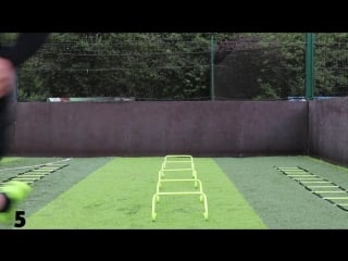 Football training warm up drills using speed agility hurdles