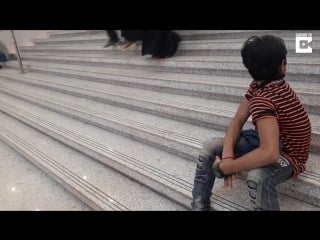 Pakistani boy turns head like owl