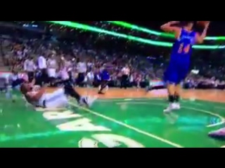 Marcus smart goes down after rolling ankle on justin holiday's foot