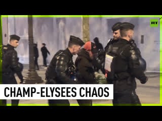 Clashes erupt on champ elysees as protests persist in france