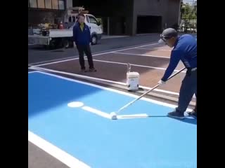 I had no idea these were done freehand, painting a disabled parking sign that is steady now