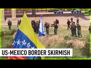 Border patrol agents shoot pepper balls at migrants trying to cross into us