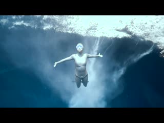 Anna and the sandfall in deans blue hole