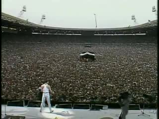 This is queen at wembley stadium during live aide just look at the massive croud!! imagine 90k armys waving their light sticks